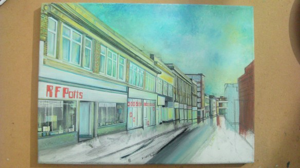 showing update after buildings on the left hand of the street had been painted.